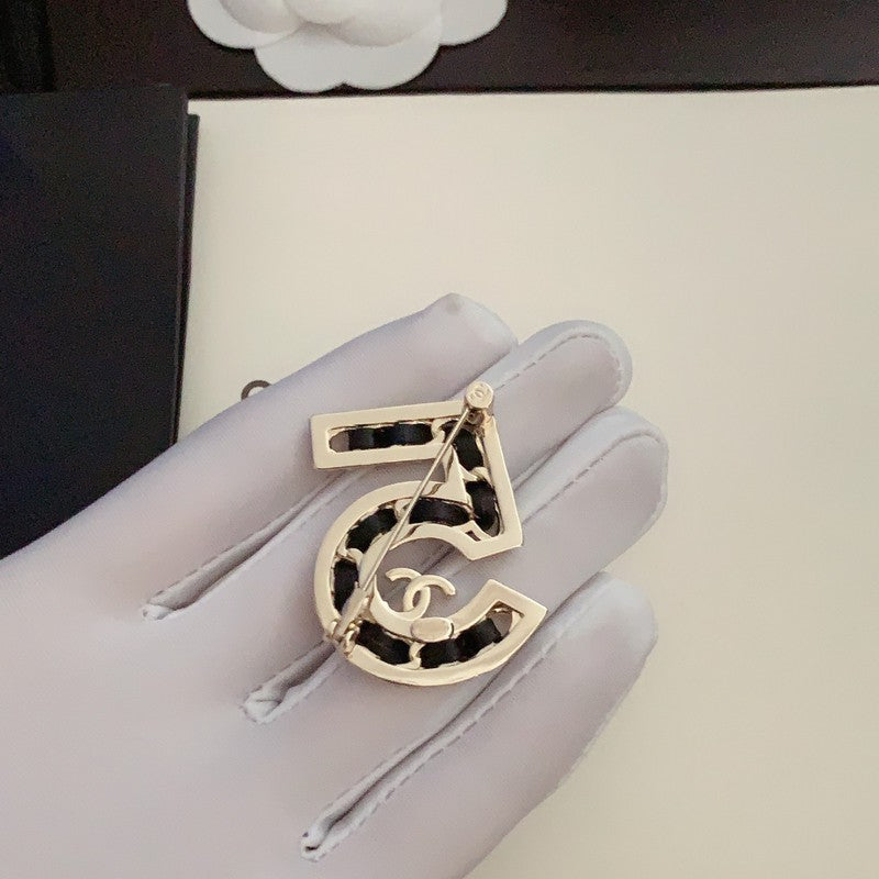 Chanel No.5 Leather Diamond 18K Gold Brooch